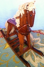 Flat seat rocking horse