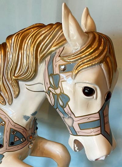 Pink and Blue Rocking Horse face