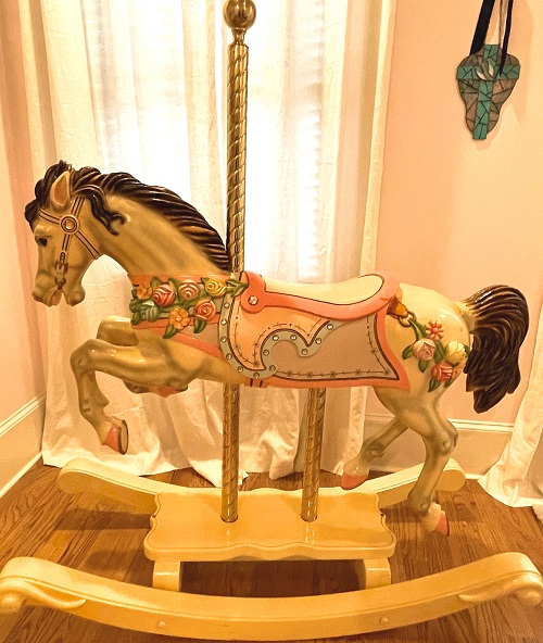 Flowered carousel horse